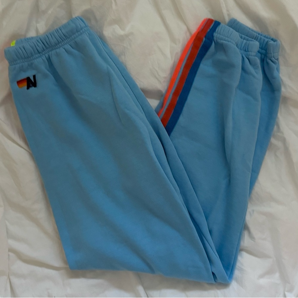 Aviator Nation Light Blue Track Pants with Rainbow Stripes